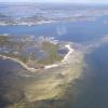 The islands of the Cedar Keys welcome you. Escape.